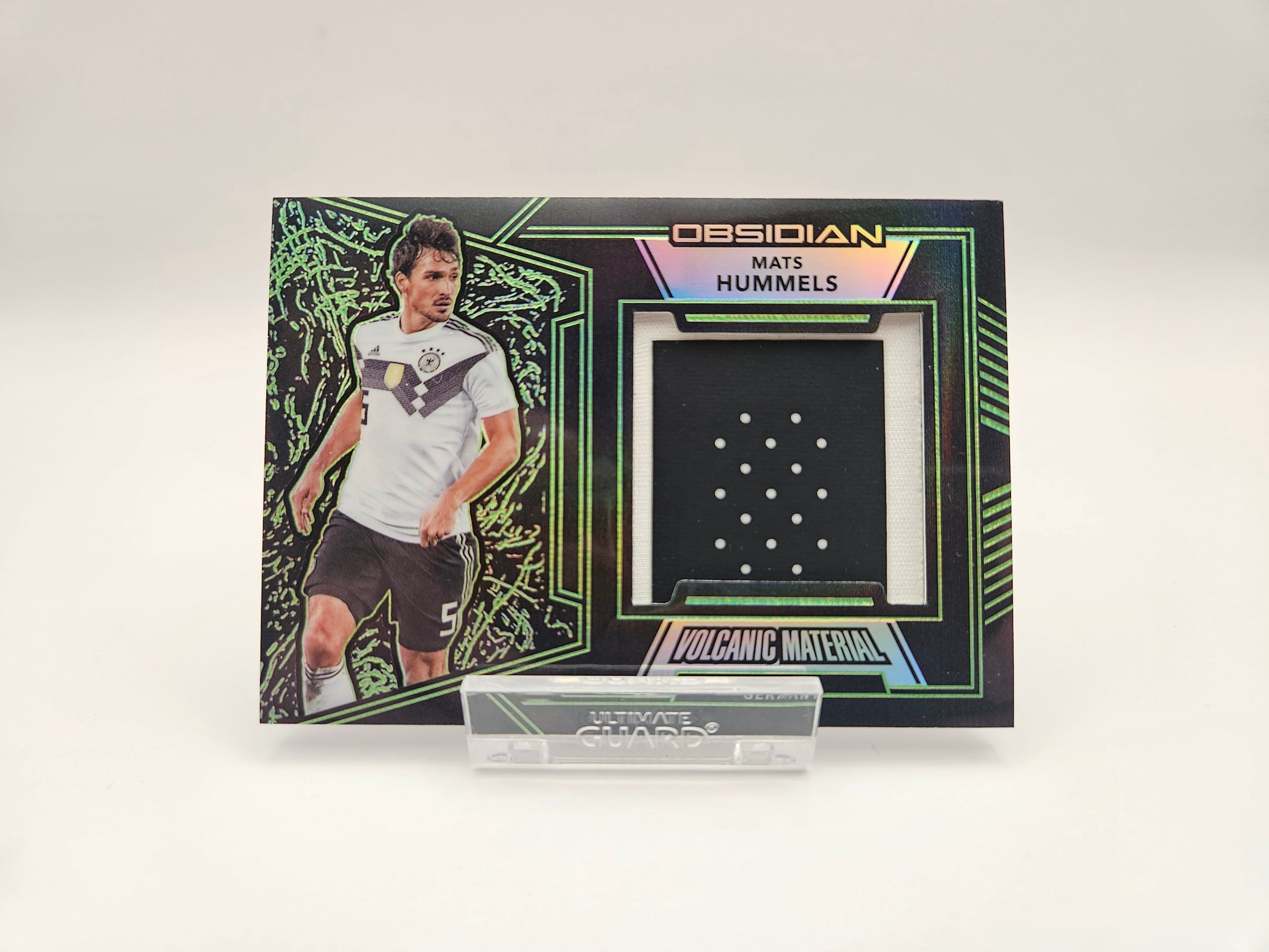 Mats Hummels (23/25) Volcanic Material - Germany - Panini Obsidian - SINGLE